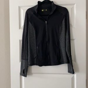 Black/gray fitted athletic top. Size medium.